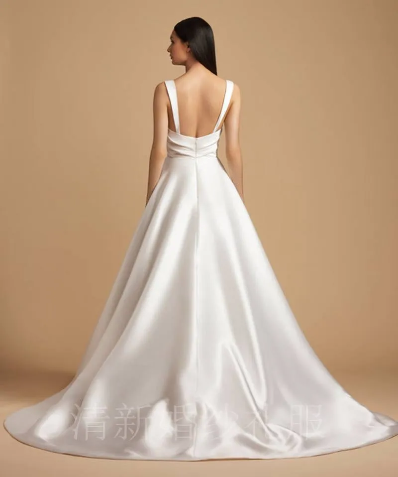 Spring new minimalist satin wedding dress fashion princess sling show thin drag tail bride wedding light wedding dress.